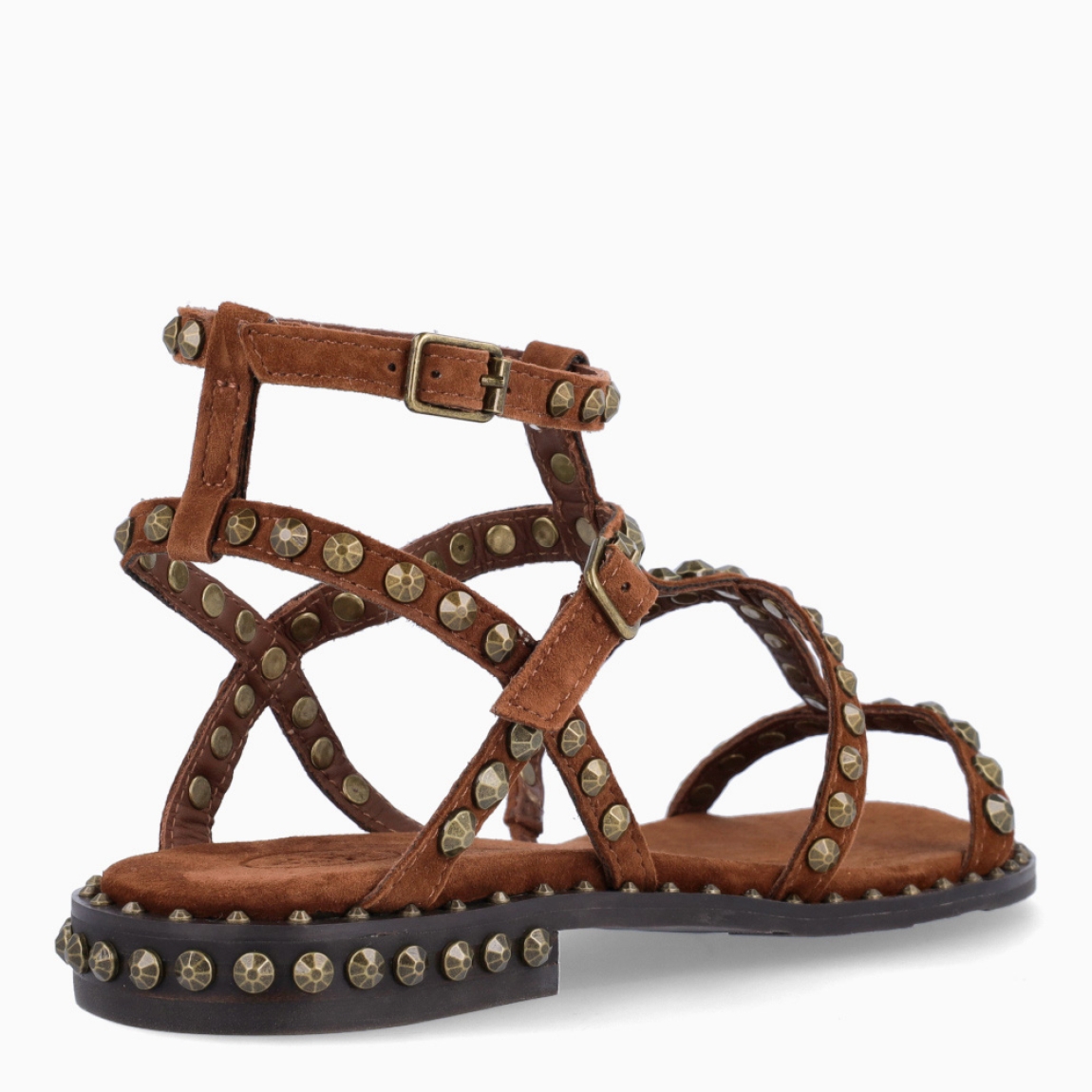 Sandalias de la marca ASH, modelo PRECIOUS. Elaboradas en ante color marrón con detalle de tachuelas doradas y tiras hasta arriba. Interior en ante color marrón. Cierre de sandalias ASH con doble hebilla en tobillo. Suela plana de goma. Estas sandalias ASH PRECIOUS son ideales para llevar tus looks de temporada con estilo y comodidad!