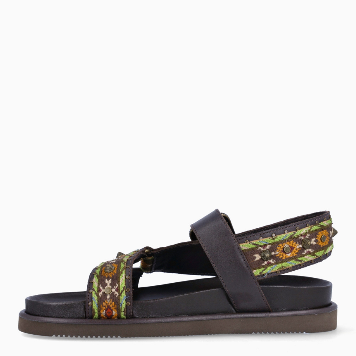 Sandalias de la marca ASH, modelo UNICA. Elaboradas en piel color marrón con estampado de figuras y colores simbolizando cultura africana. Interior en piel color negro. Cierre de sandalias ASH con hebilla en tobillo con aplicaciones en plateado. Suela de goma plana. Estas sandalias ASH UNICA son un complemento ideal en estilo y comodidad, una pieza que no te puede faltar en tus looks de temporada!