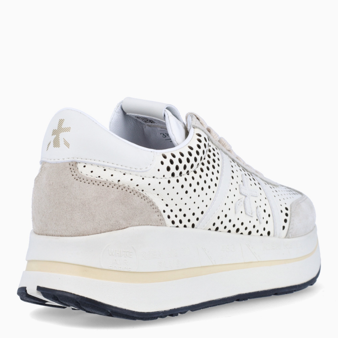 Deportiva de la marca Premiata, modelo Bethcoin. Exterior de la deportiva en piel color beig con troquelado y con detalles en ante. Interior de la deportiva de piel de color blanco. Cierre de la deportiva con cordones. Suela de la deportiva de goma con 3cm de plataforma. Deportiva con plantilla acolchada para garantizar la máxima comodidad a cada paso. La deportiva Bethcoin de Premiata es una evolución de los modelos Conny y Beth, fusionados en una nueva versión ideal para marcar estilo.