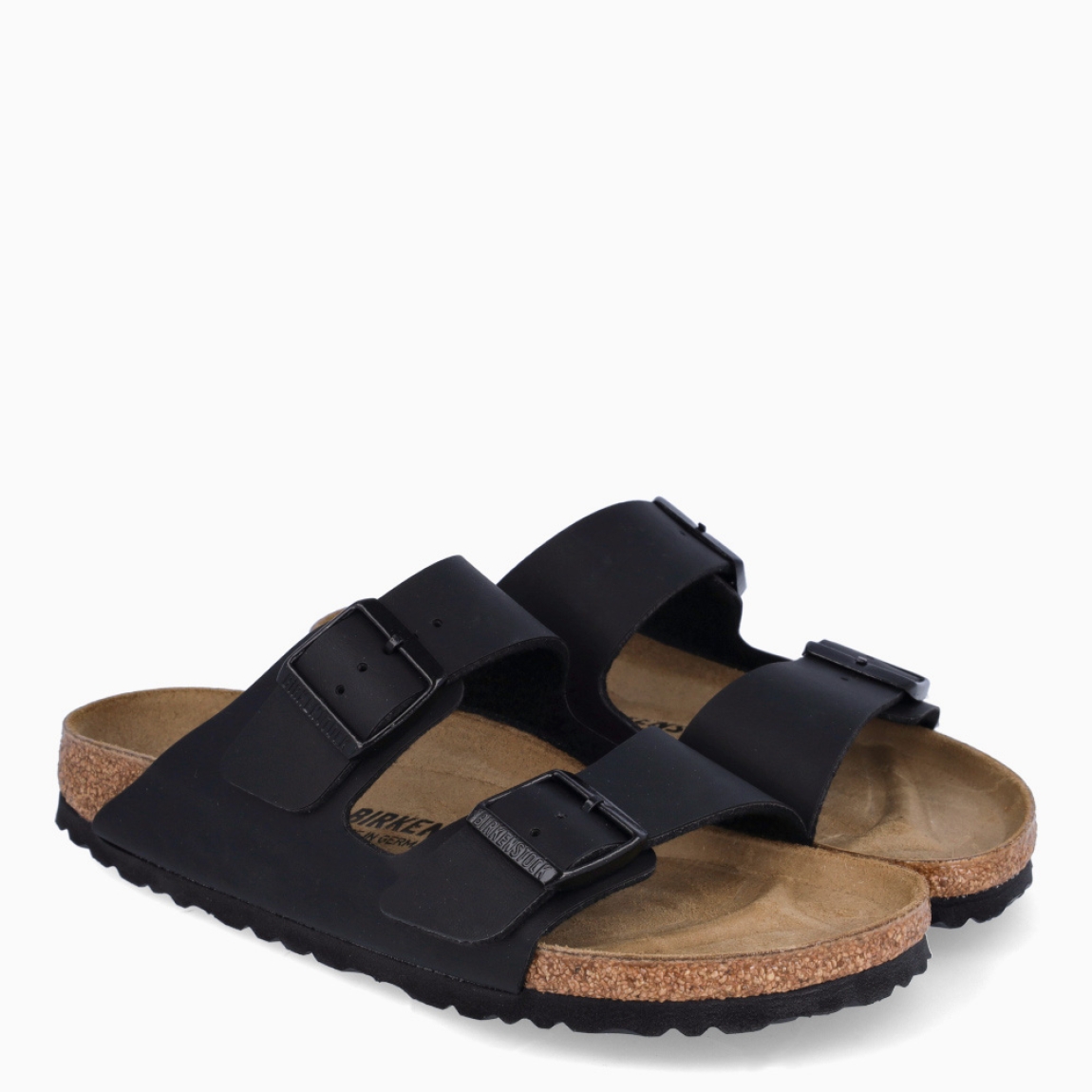 Sandalias de la marca Birkenstock, modelo ARIZONA BIRKO-FLOR. Sandalias elaboradas en neopreno de color negro con una base de corcho y látex de forma anatómica. Cierre de las sandalias con doble hebilla de espiga de metal con ajuste individual. Estas sandalias Birkenstock ARIZONA BIRKO-FLOR es un complemento clásico para tus looks de temporada, con un diseño sencillo atemporal y una ligereza que te dará la comodidad que necesitas en tu día a día.