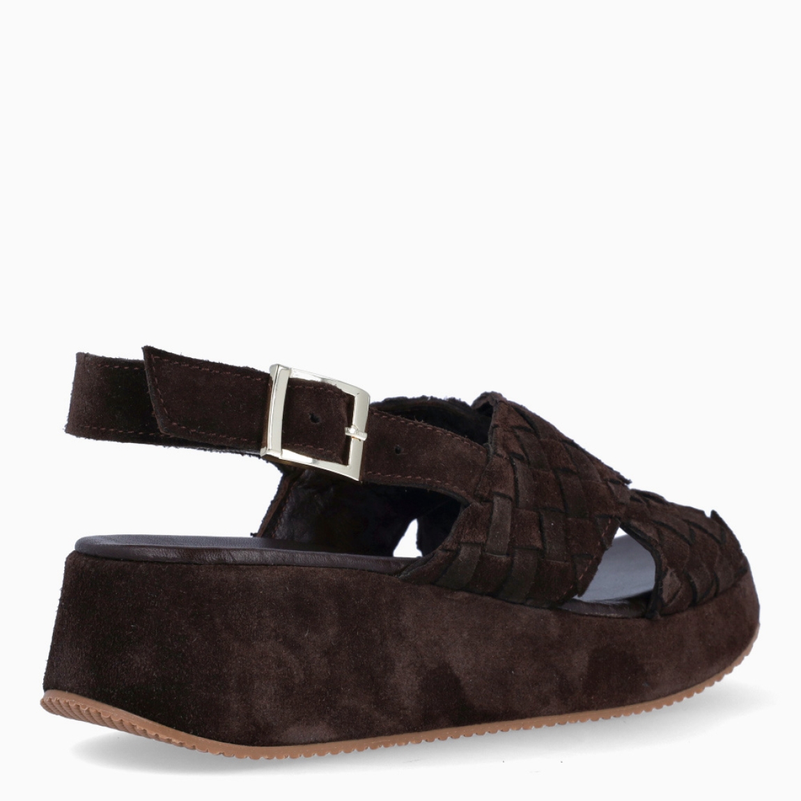 Sandalias de la marca Itse, modelo BRUNELLA. Elaboradas en en ante color marrón con tiras cruzadas en pala con efecto trenzado. Interior en ante color marrón. Cierre de sandalias con hebilla en el tobillo. Suela con plataforma de 5cm de altura. Estas sandalias Itse BRUNELLA son ideales para esta temporada!