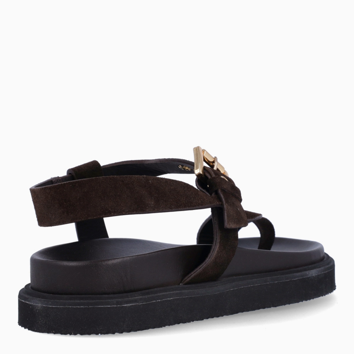 Sandalias de la marca Itse, modelo REGINNA. Elaboradas en ante color marrón oscuro con tiras en forma de S en pala. Interior en piel color marrón y cierre con hebilla en tobillo. Sandalias Itse con suela plana de goma. Estas sandalias Itse REGINNA son un complemento ideal para ti!