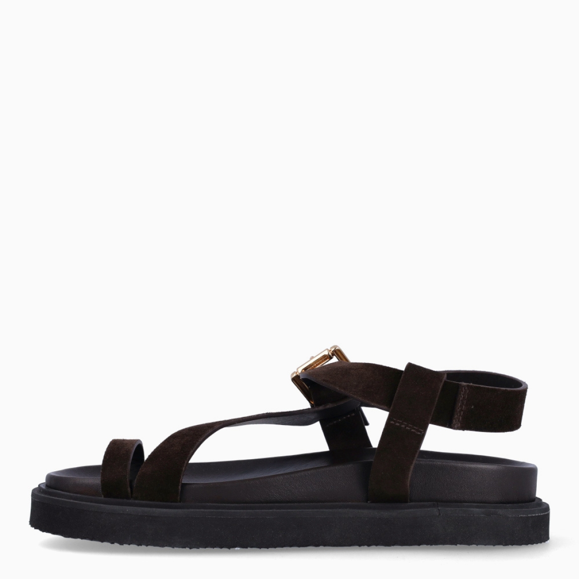 Sandalias de la marca Itse, modelo AMALIA. Elaboradas en ante color marrón oscuro con tiras en forma de S en pala. Interior en piel color marrón y cierre con hebilla en tobillo. Sandalias Itse con suela plana de goma. Estas sandalias Itse AMALIA son un complemento ideal para ti!