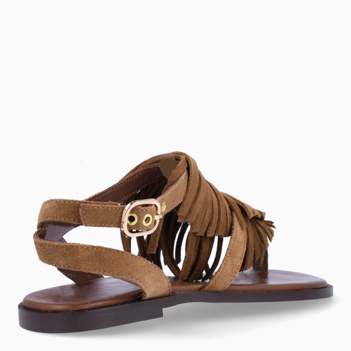 Sandalias esclavas de la marca INUOVO, modelo IVANNA. Elaboradas en piel color camel con flecos en pala y adornos de piedreía doradas incrustadas. Interior en piel color marrón. Cierre con hebilla en tobillo. Sandalias INUOVO IVANNA, complemento ideal para lucir tus looks con estilo y comodidad!