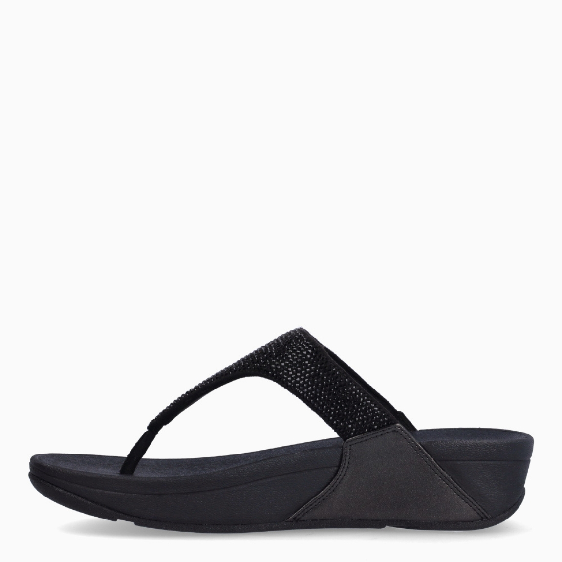 Sandalias de la marca Fitflop, modelo LULU. Sandalias elaboradas en neopreno color negro con brillantes en pala. Interior de esclavas en neopreno color negro. Suela de goma con una cuña de 6cm de altura. Estas sandalias Fitflop LULU son ideales para esta temporada!