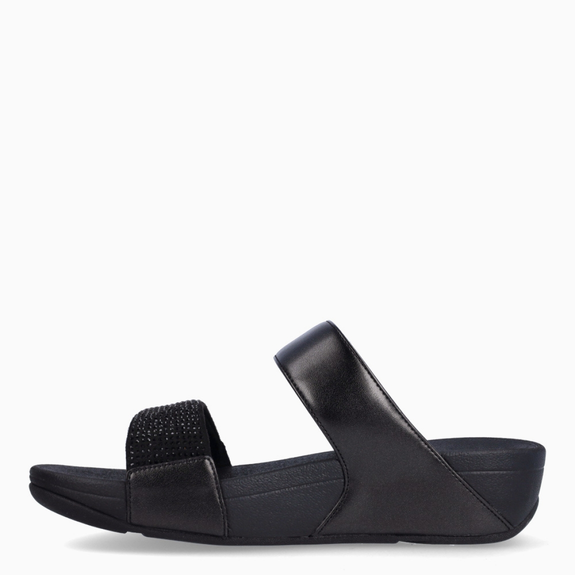 Sandalias de la marca Fitflop, modelo LULU-STRAPS. Sandalias elaboradas en neopreno color negro con brillantes en pala y doble tira. Interior de esclavas en neopreno color negro. Suela de goma con una cuña de 6cm de altura. Estas sandalias Fitflop LULU-STRAPS son ideales para esta temporada!