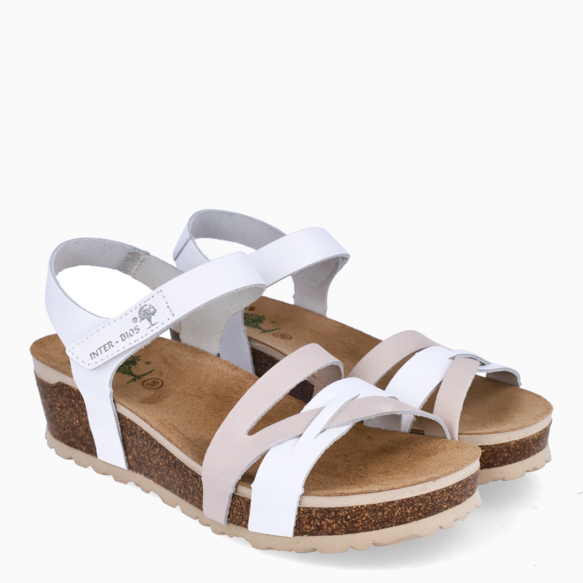 Sandalias de la marca Inter Bios, modelo MIA. Sandalias con tiras elaboradas en piel blanco y beig. Cierre de las sandalias con velcro y suela de goma con cuña de 5cm de altura. Estas sandalias Inter Bios MIA son ideales para elevar tus looks con la comodidad máxima que necesitas en tu día a día.