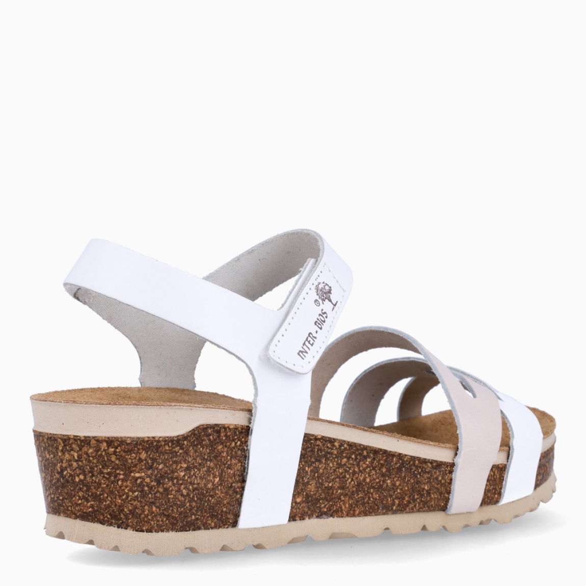 Sandalias de la marca Inter Bios, modelo MIA. Sandalias con tiras elaboradas en piel blanco y beig. Cierre de las sandalias con velcro y suela de goma con cuña de 5cm de altura. Estas sandalias Inter Bios MIA son ideales para elevar tus looks con la comodidad máxima que necesitas en tu día a día.