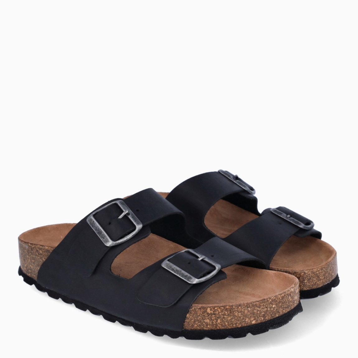 Sandalias Itse, modelo BASTILLE. Sandalias elaboradas en piel color negro. Sandalias con cierre de doble hebilla en la pala. Interior en corcho. Suela plana. Sandalias Itse BASTILLE, ideal para llevar en tu día a día, con comodidad y frescura.