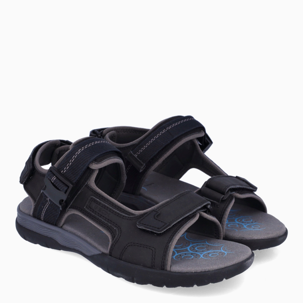 Sandalias de hombre de la marca Geox, modelo SPHERICA EC5 B. Sandalias elaboradas en piel color negro. Sandalias con tiras en pala y cierre en velcro. Interior en piel color nude, acolchado para más comodidad durante el día. Sandalias Geox SPHERICA EC5 B, ideal como básico de todos los días!