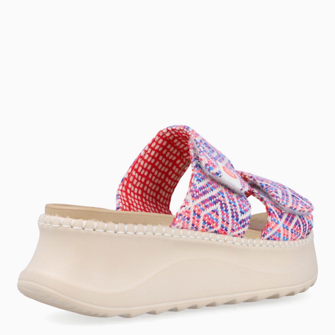 Sandalias de la marca Heydude, modelo DELRAY. Exterior elaborado en tela multicolor con diseños estampados. Interior en piel color camel. Cierre de sandalias Heydude con doble velcro en la pala. Sandalias con cuña de 5cm de altura. Estas sandalias Heydude DELRAY son un complento básico, clásico y cómodo para tu día a día!