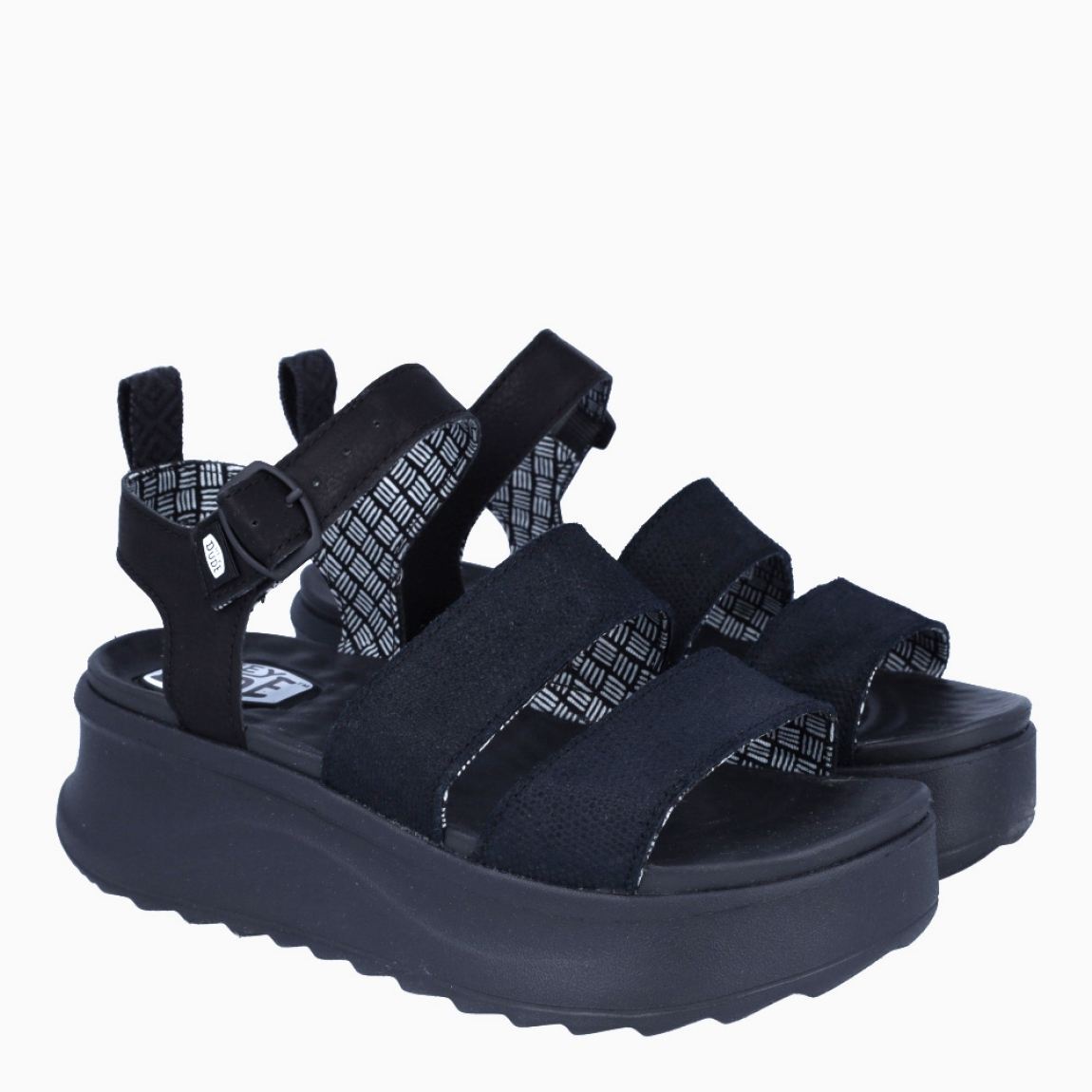 Sandalias de la marca Heydude, modelo DELRAY BUCKLE. Exterior elaborado en tela color negro. Interior en piel color negro. Cierre de sandaias Heydude con hebilla en tobillo. Sandalias con cuña de 5cm de altura. Estas sandalias Heydude DELRAY BUCKLE son un complento básico, clásico y cómodo para tu día a día!