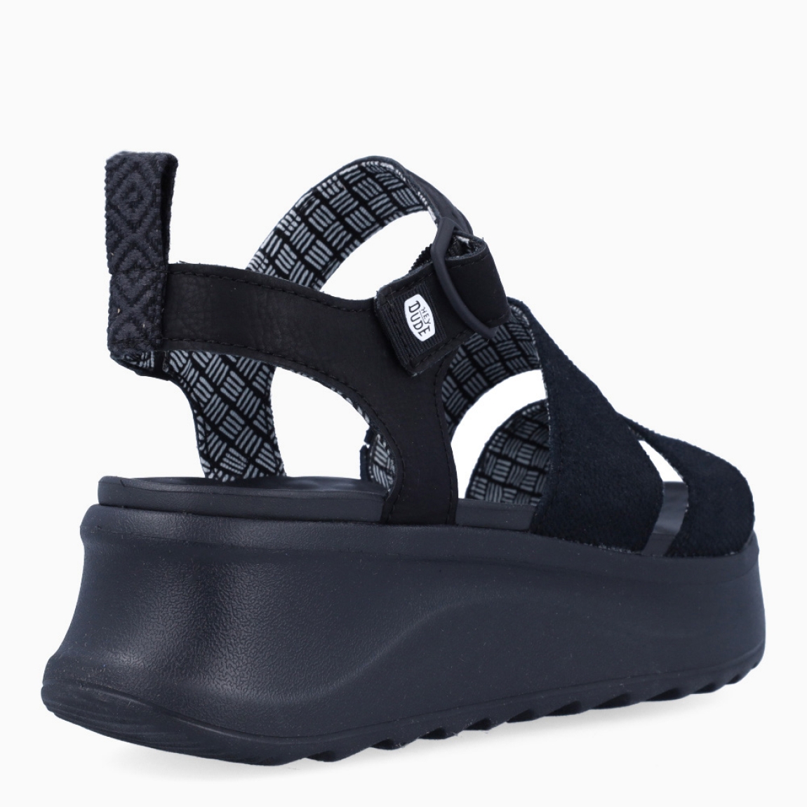 Sandalias de la marca Heydude, modelo DELRAY BUCKLE. Exterior elaborado en tela color negro. Interior en piel color negro. Cierre de sandaias Heydude con hebilla en tobillo. Sandalias con cuña de 5cm de altura. Estas sandalias Heydude DELRAY BUCKLE son un complento básico, clásico y cómodo para tu día a día!