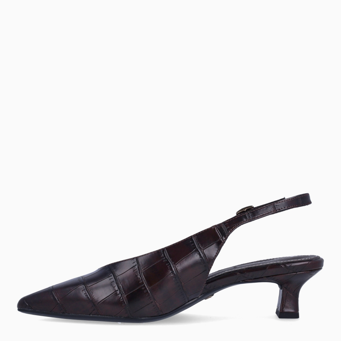 Los salones Tamaris QUEENIE combinan elegancia y comodidad en un diseño perfecto para cualquier ocasión. Están confeccionados en piel de color marrón con un sofisticado acabado efecto cocodrilo, que aporta un toque distintivo y actual. Incorporan un tacón de 4 cm de altura, ideal para proporcionar una ligera elevación y garantizar el confort durante largas jornadas. Su punta afilada realza la silueta del calzado con un aire refinado y femenino. Cuentan con cierre mediante hebilla ajustable para un ajuste seguro y personalizado, además de una plantilla suave que ofrece una mayor comodidad en cada paso. Los Tamaris QUEENIE son la opción perfecta para transformar cualquier look en un conjunto formal y elegante, sin renunciar a un estilo moderno y versátil.