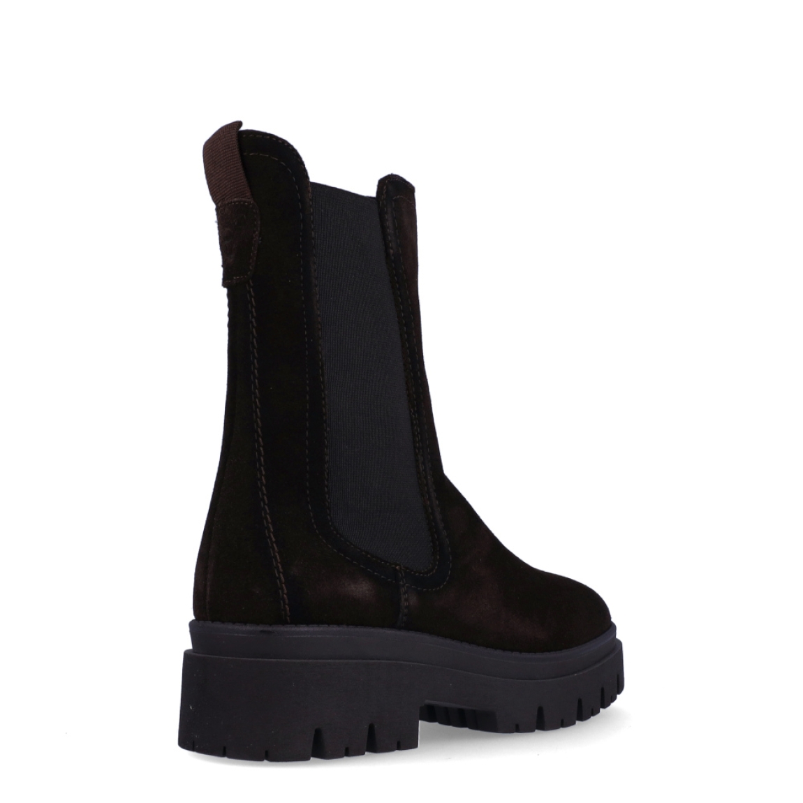Botines chelsea de caña media de la marca Tamaris, modelo FOREST. Confeccionados en suave piel de ante en un profundo tono marrón oscuro, presentan un diseño depurado con elásticos laterales anchos y tirador trasero para un calce suave y rápido. Incorporan plantilla interior acolchada de alto confort y una suela track de goma dentada con cuña de 5 cm que aísla del frío y garantiza una pisada firme y estable. Combinan genial con tejanos anchos, pantalones de vestir o vestidos midi fluidos con abrigo de paño para un estilismo actual y favorecedor. ¡El fondo de armario imprescindible que aúna tendencia, altura y máxima comodidad!
