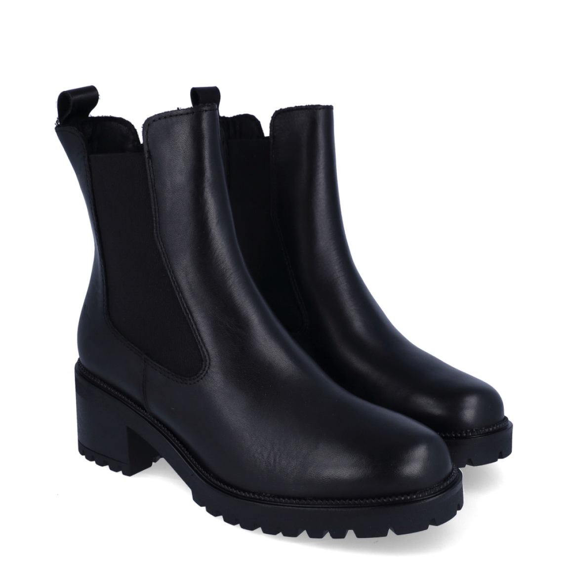 Botines chelsea de tacón de la marca Tamaris, modelo CITY. Confeccionados en suave piel lisa de primera calidad en color negro, presentan una elegante silueta de caña media con elásticos laterales y tirador trasero para un calce rápido y flexible. Incorporan una plantilla interior acolchada de alto confort, un estable tacón ancho en bloque de 5 cm y una suela track de goma dentada que garantiza un agarre seguro en cualquier superficie. Ideales para combinar con pantalones de vestir, faldas midi plisadas o tejanos anchos con blazer estructurada para un estilismo actual y favorecedor. ¡El botín todoterreno perfecto para estilizar la figura sin renunciar al máximo confort!