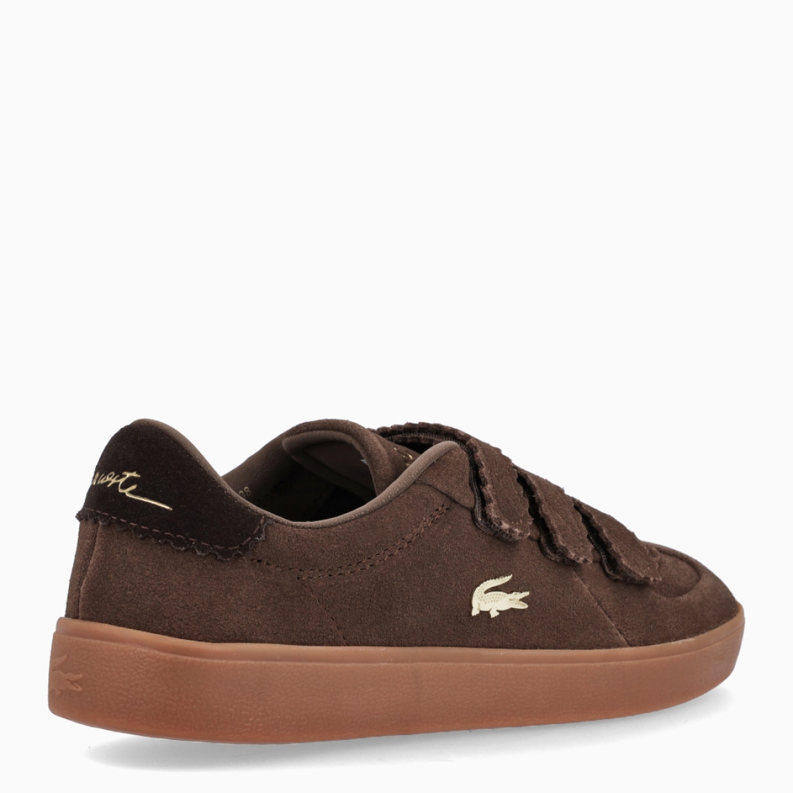Deportivas de la marca Lacoste, modelo Baseshot Pro Strap. Deportivas con una versión sofisticada de un estilo clásico de Lacoste. Combina una elegante parte superior de ante de primera calidad color marrón, tiras de velcro onduladas y detalles de marca dorados, como un cocodrilo metálico central. Un modelo sofisticado que se complementa con una suela de caucho reforzada y de alta adherencia. Deportivas Lacoste Baseshot Pro Strap, modelo elagante e ideal para tus looks de temporada!
