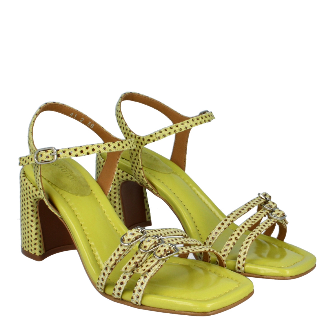 Sandalias de la marca Audley, modelo LEMON. Exterior de las sandalias en piel color verde con estampado de puntos color marrón. Interior de las sandalias en piel color verde. Cierre de las sandalias Audley con hebillas, una en el talón y tres en la pala. Sandalias Audley con tacón de 6cm de altura. Estas sandalias Audley, modelo LEMON, tienen un diseño y color atrevido. Te hará lucir un look único!