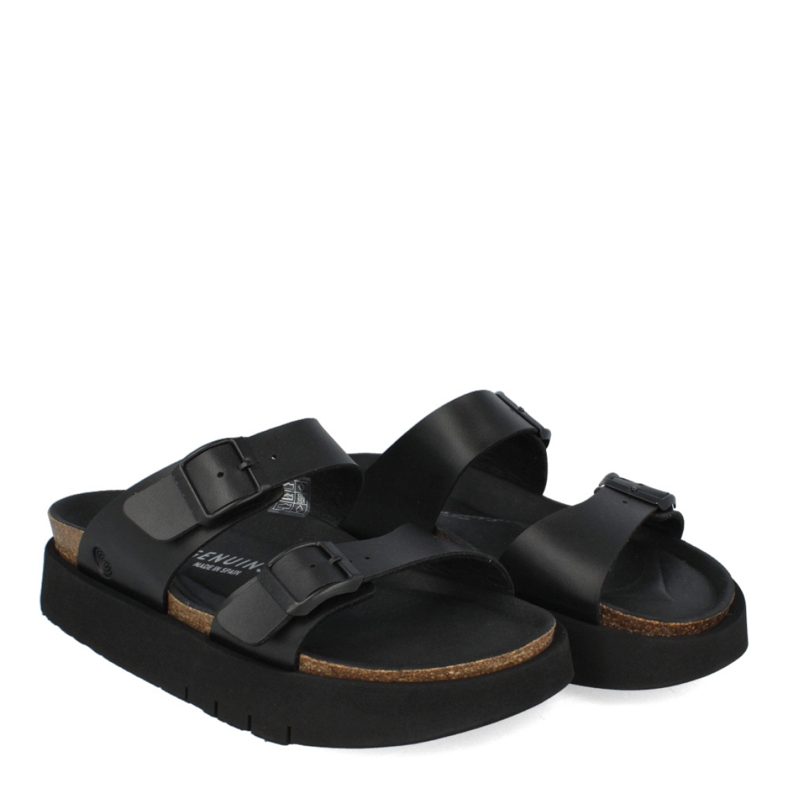 Sandalias de la marca Genuins, modelo G10. Exterior e interior de las sandalias en piel color negro. Cierre de las sandalias Genuinns con doble hebilla en la pala y empeine. Sandalias con plataforma de goma. Estas sandalias Genuins G10 son unas clásicas de temporada. Podrás armar diferentes looks con la máxima comodidad posible en tu día a día.