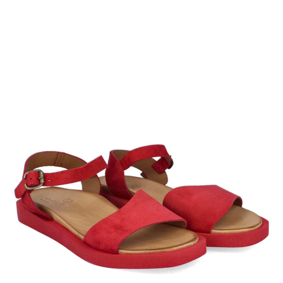 Sandalias de la marca Itse, modelo VILMA. Exterior de las sandalias en ante color rojo. Interior de las sandalias en piel color marrón. Cierre de las sandalias con hebilla en el tobillo y suela plana. Estas sandalias Itse VILMA tienen el color rojo tendencia de temporada, lo que hará resaltar tus looks a donde vayas.