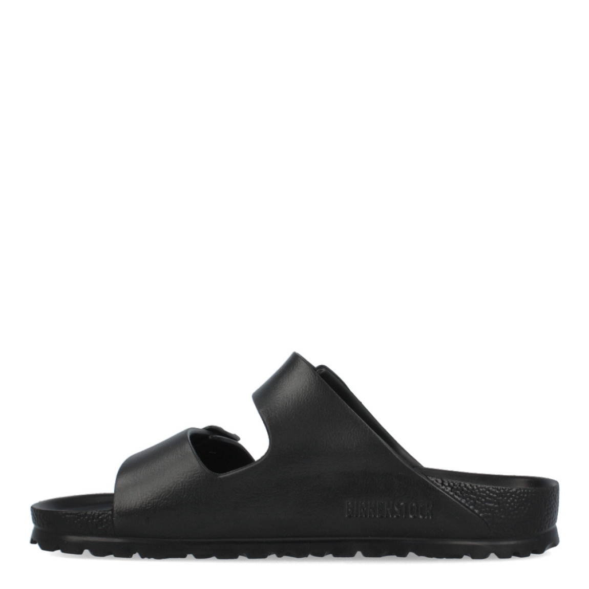 Sandalias de la marca Birkenstock, modelo ARIZONA EVA. Sandalias elaboradas en neopreno de alta calidad color negro. Cierre de las sandalias con doble hebilla, en el empeine y la pala. Sandalias con suela plana y de goma. Estas sandalias Birkenstock ARIZONA EVA son un complemento clásico para esta temporada, podrás combinarlo con diferentes outifts y disfrutar de una comodidad máxima. No te puede faltar en el armario.