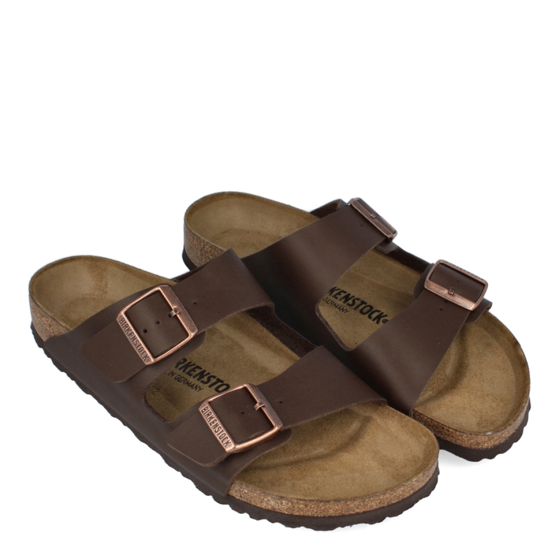 Sandalias de la marca Birkenstock, modelo ARIZONA BIRKO-FLOR. Sandalias elaboradas en neopreno de alta calidad de color marrón con una base de corcho y látex de forma anatómica. Cierre de las sandalias con doble hebilla de espiga de metal con ajuste individual en empeine y pala. Estas sandalias Birkenstock ARIZONA BIRKO-FLOR son un complemento ideal para la temporada, su diseño simple atemporal, lo hace el accesorio clásico para tus looks!