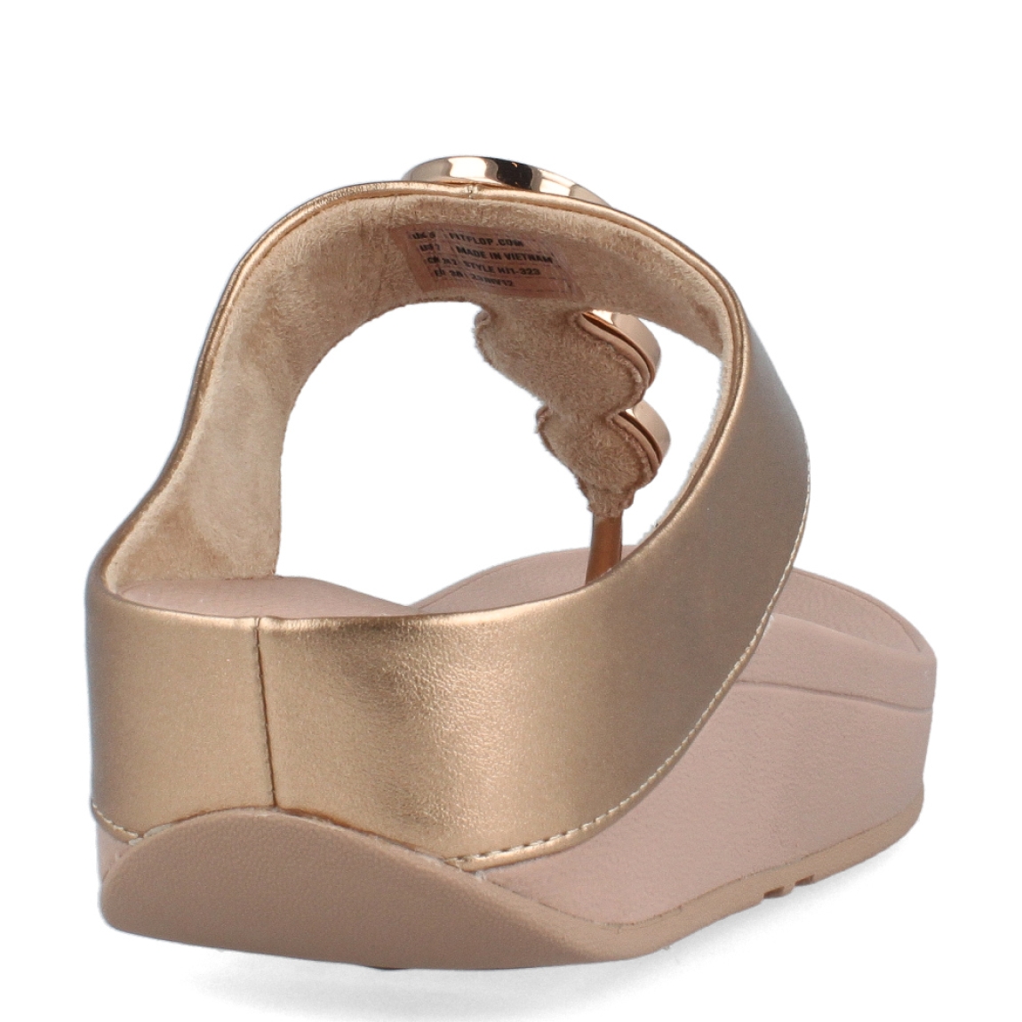 Esclavas de la marca Fitflop, modelo HALO. Esclavas elaboradas en piel color nude con detalle de círculos dorados brillantes en la pala. Esclava Fitflop con cuña de 4cm de altura. Estas esclavas Fitflop HALO son un complemento básico para esta temporada, disfrutarás de una comodidad excepcional en tu día a día.
