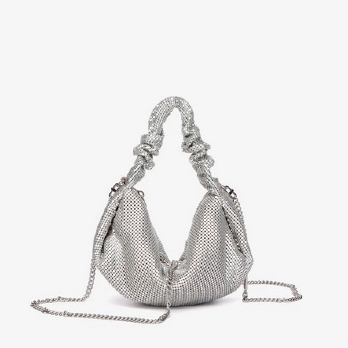Bolso de la marca Abbacino, modelo LUCY. Bolso elaborado con malla metálica color plata. Interior en forro textil. Cierre del bolso con cremallera. Bolso Binnari con asa de mano drapeada y una práctica bandolera de cadena de quita y pon. Medidas del bolso: alto 12cm y ancho 24cm. Este bolso Binnari LUCY es un complemento ideal para lucir tus looks de día y noche.