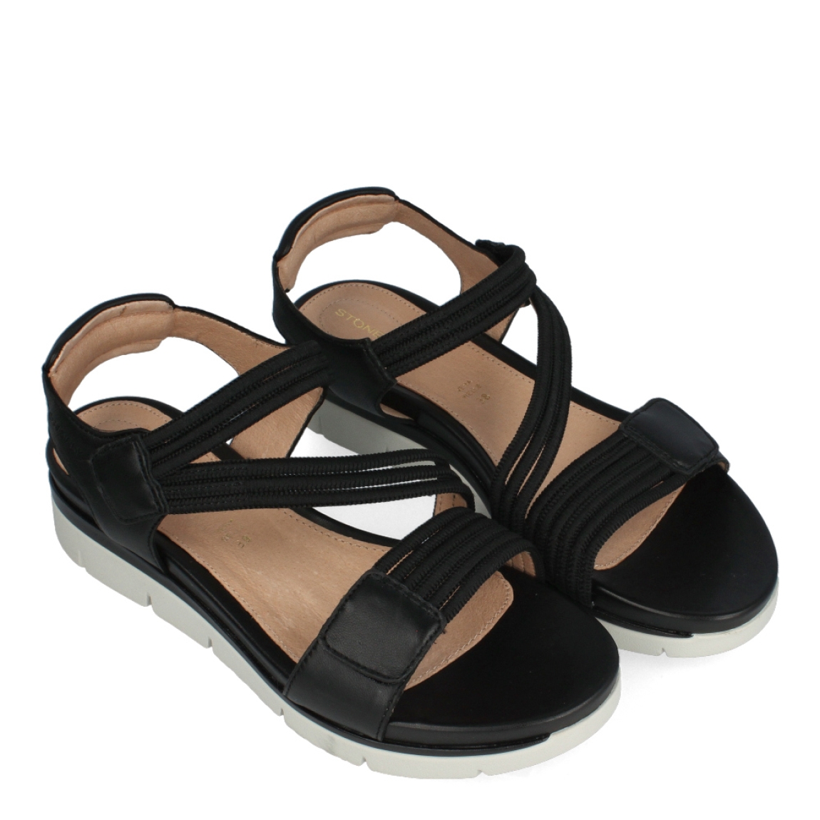 Sandalias de la marca Stonefly, model ARIA. Exterior de las sandalias en piel color negro e interior en piel color nude. Cierre de las sandalias con velcro y cuña de 3cm de altura. Estas sandalias Stonefly son unas clásicas para esta temporada, podrás combinarla con todos tus looks y gozar de una máxima comodidad en tu día a día.