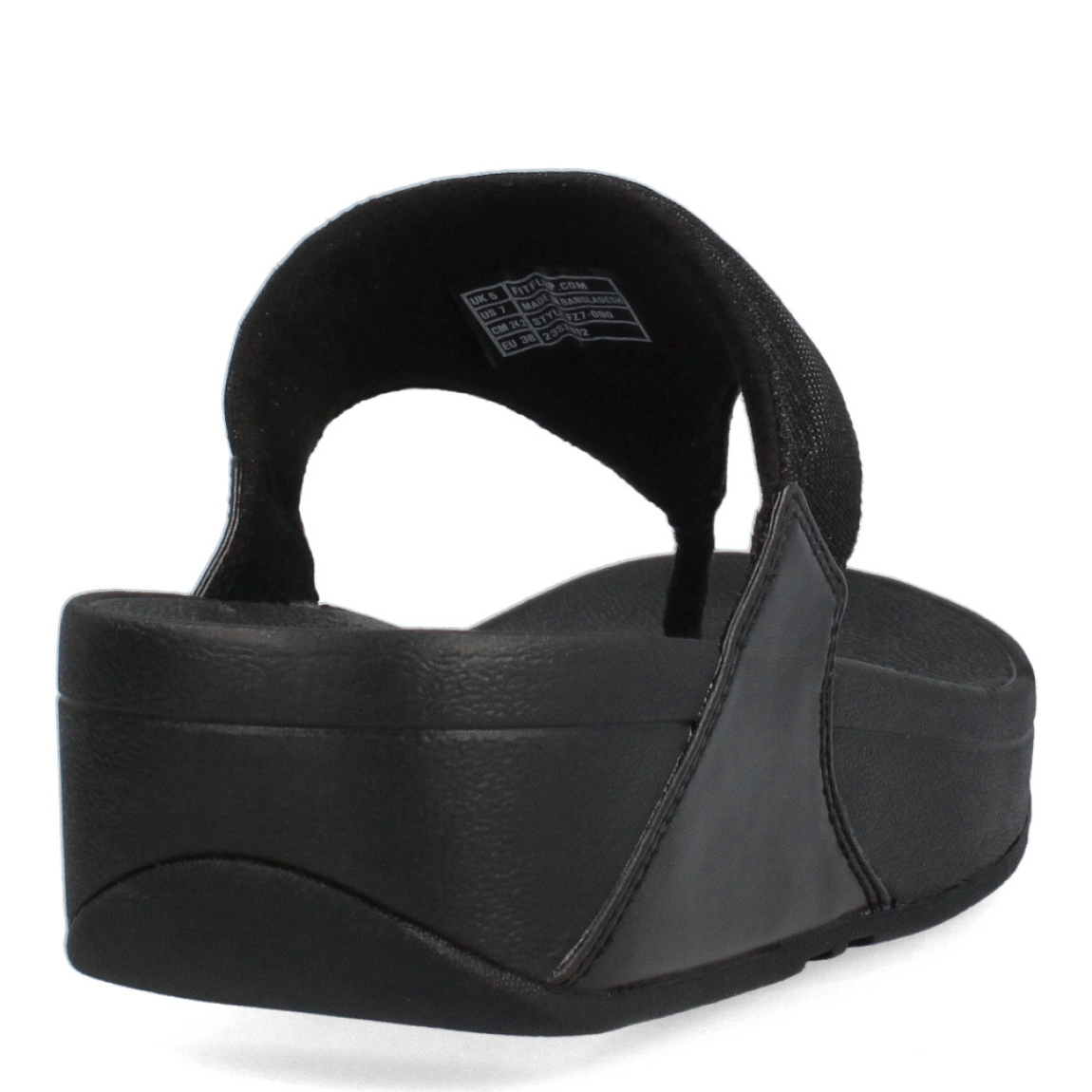 Esclavas de la marca Fitflop, modelo LULU. Exterior de las esclavas en neopreno color negro con glitter en la pala. Esclavas con suela de goma y cuña de 3cm de altura. Estas esclavas Fitflop LULU son un complemento clásico para esta temporada, podrás disfrutar de una comodidad en tus looks del día a día.
