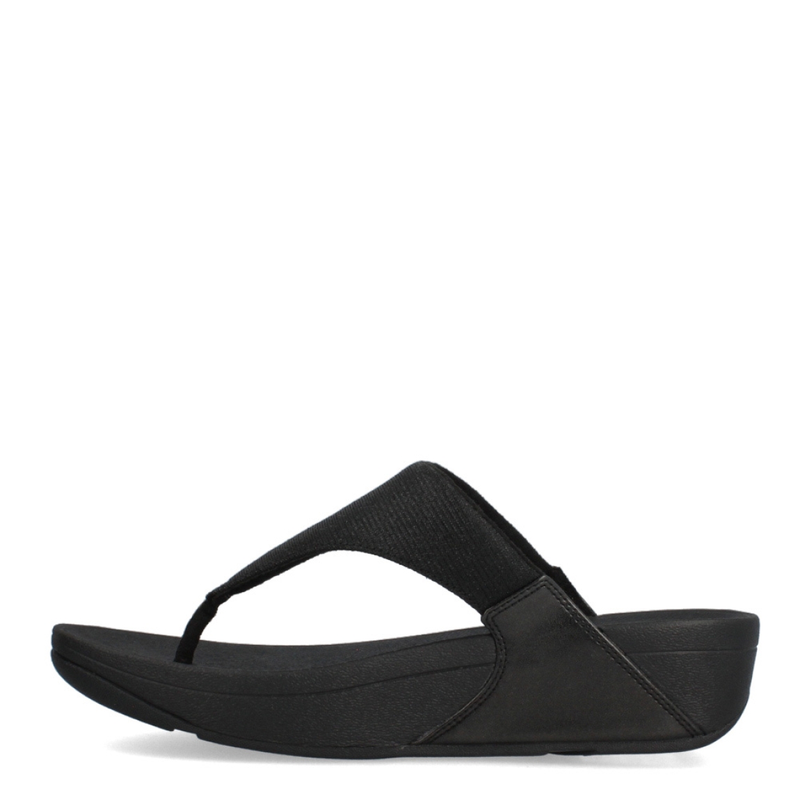 Esclavas de la marca Fitflop, modelo LULU. Exterior de las esclavas en neopreno color negro con glitter en la pala. Esclavas con suela de goma y cuña de 3cm de altura. Estas esclavas Fitflop LULU son un complemento clásico para esta temporada, podrás disfrutar de una comodidad en tus looks del día a día.