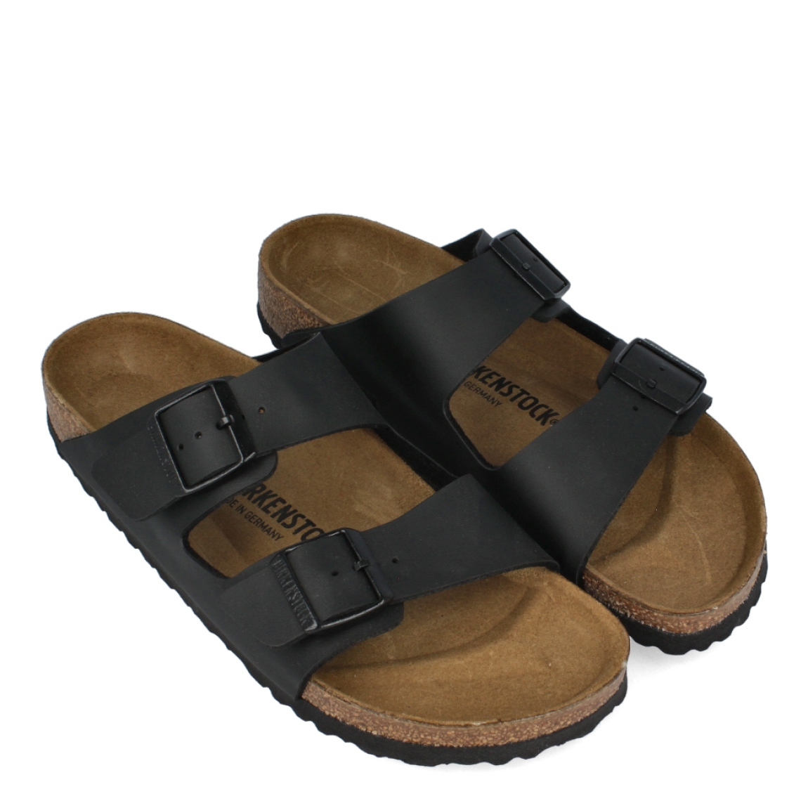Sandalias de la marca Birkenstock, modelo ARIZONA BIRKO-FLOR. Sandalias elaboradas en neopreno de alta calidad color negro con una base de corcho y látex de forma anatómica. Cierre de las sandaluias con doble hebilla de espiga de metal con ajuste individual, en empeine y pala. Estas sandalias Birkenstock ARIZONA BIRKO-FLOR son un complemento ideal para esta temporada, su diseño simple atemporal, lo hace el accesorio clásico para tus looks!