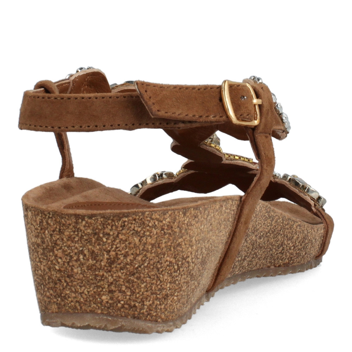 Sandalias de la marca Itse, modelo MOCHICA. Exterior de las sandalias en ante color marrón con detalles en pedrería. Interior de las sandalias en ante colro marrón. Cierre de las sandalias con hebilla y cuña de 3cm de altura. Estas sandalias Itse MOCHICA son un complemento ideal para crear looks con estilo y comodidad, tanto de día como de noche.