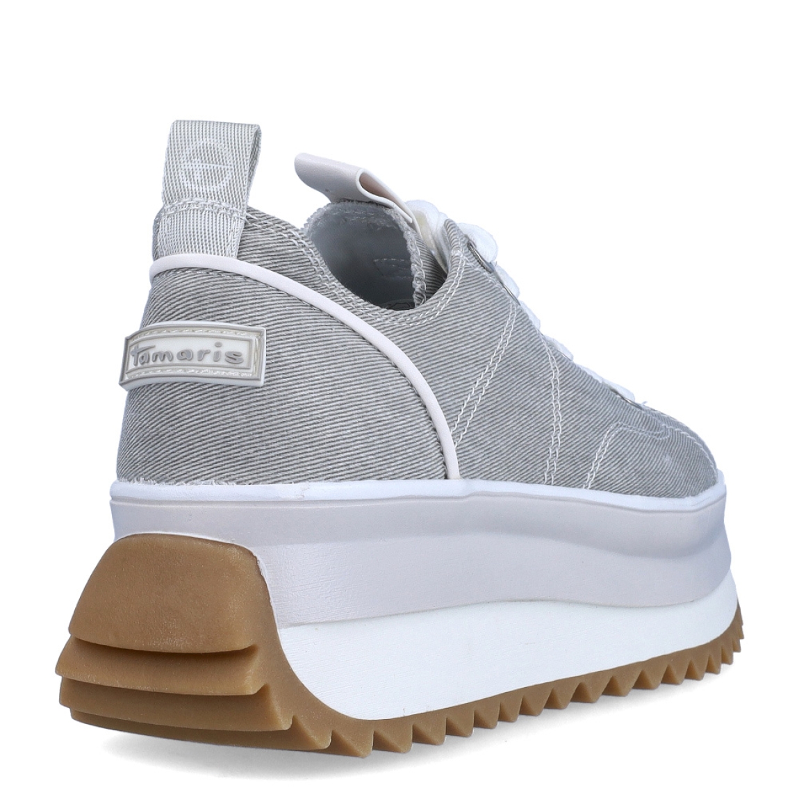 Depotivas de la marca Tamaris, modelo RAFA. Exterior de las deportivas en textil color gris. Interior de las deportivas en textil . Cierre de las deportivas con cordones en color blanco. Suelas de las deportivas Tamaris hechas de goma y dentadas. Deportivas con plataforma de 4,5cm de altura. Estas deportivas Tamaris Rafa, además de se cómodas, tienen un estilo único que te ayudarán a destacar en tu día a día.