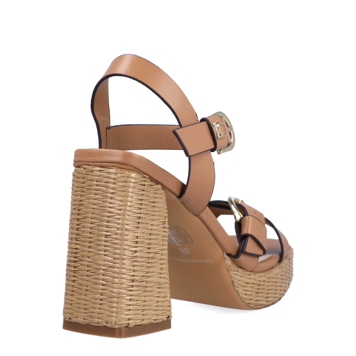 Sandalias de la marca Lola Casademunt, modelo PIURA. Exterior en piel color camel con tiras cruzadas. Interior en color nude. Cierre con doble hebilla, una en la pala y otra en el tobillo. Sandalias Lola Casademunt con tacón de 9cm de altura. Estas sandalias Lola Casademunt PIURA, son un complemento para lucir tus looks con estilo y comodidad.