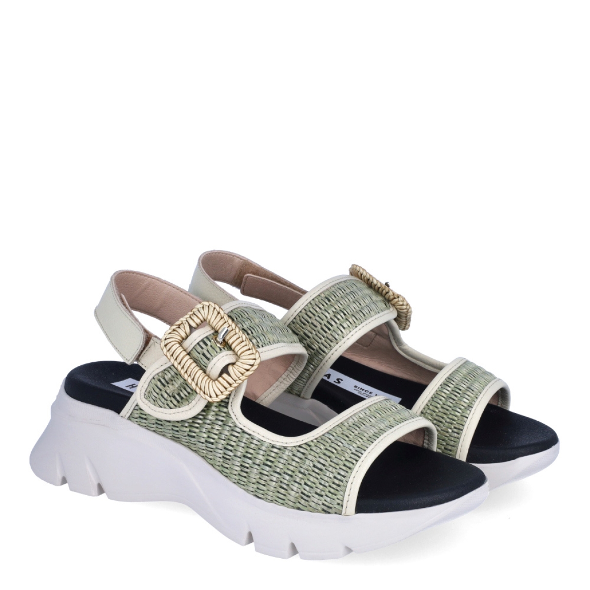 Sandalias de la marca Hispanitas, modelo LINA. Exterior de las sandalias en rafia color verde. Interior de las sandalias en piel color negro. Sandalias Hispanitas con cierre de velcro en tobillo y hebilla en pala. Sandalias con cuña de 4cm de altura. Estas sandalias Hispanitas LINA, son el complemento perfecto para tus looks de temporada, te darán estilo y comodidad sin duda!