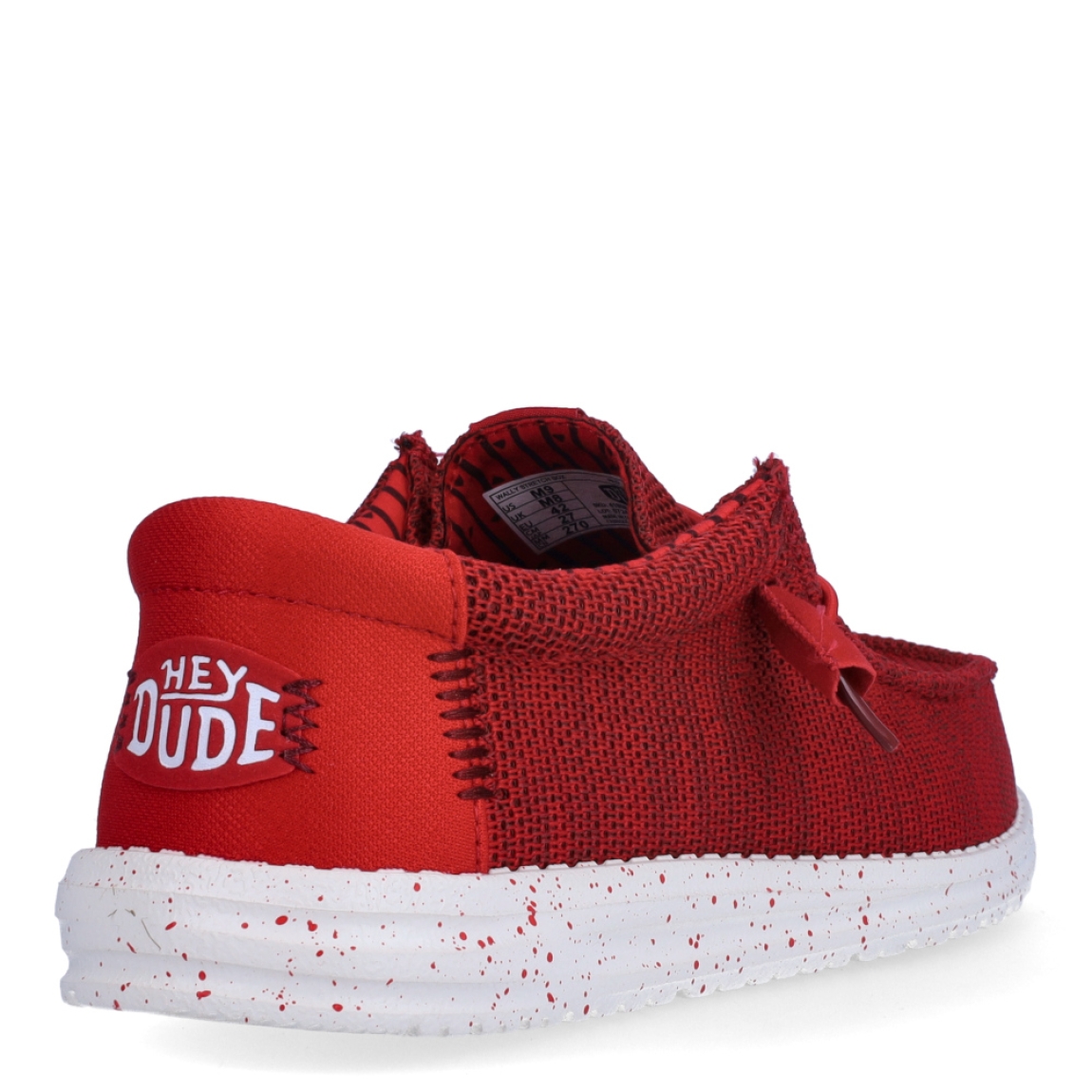 Náuticos de la marca Hey Dude, modelo WALLY STRECH. Exterior de los náuticos en tela color rojo. Interior de los náuticos en tela color rojo y plantilla acolchada y extraíble. Cierre de los náuticos Hey Dude con cordones elásticos y suela plana de goma. Estos náuticos Hey Dude WALLY STRECH, son el complemento perfecto para esta temporada, los podrás lucir con la máxima comodidad posible.