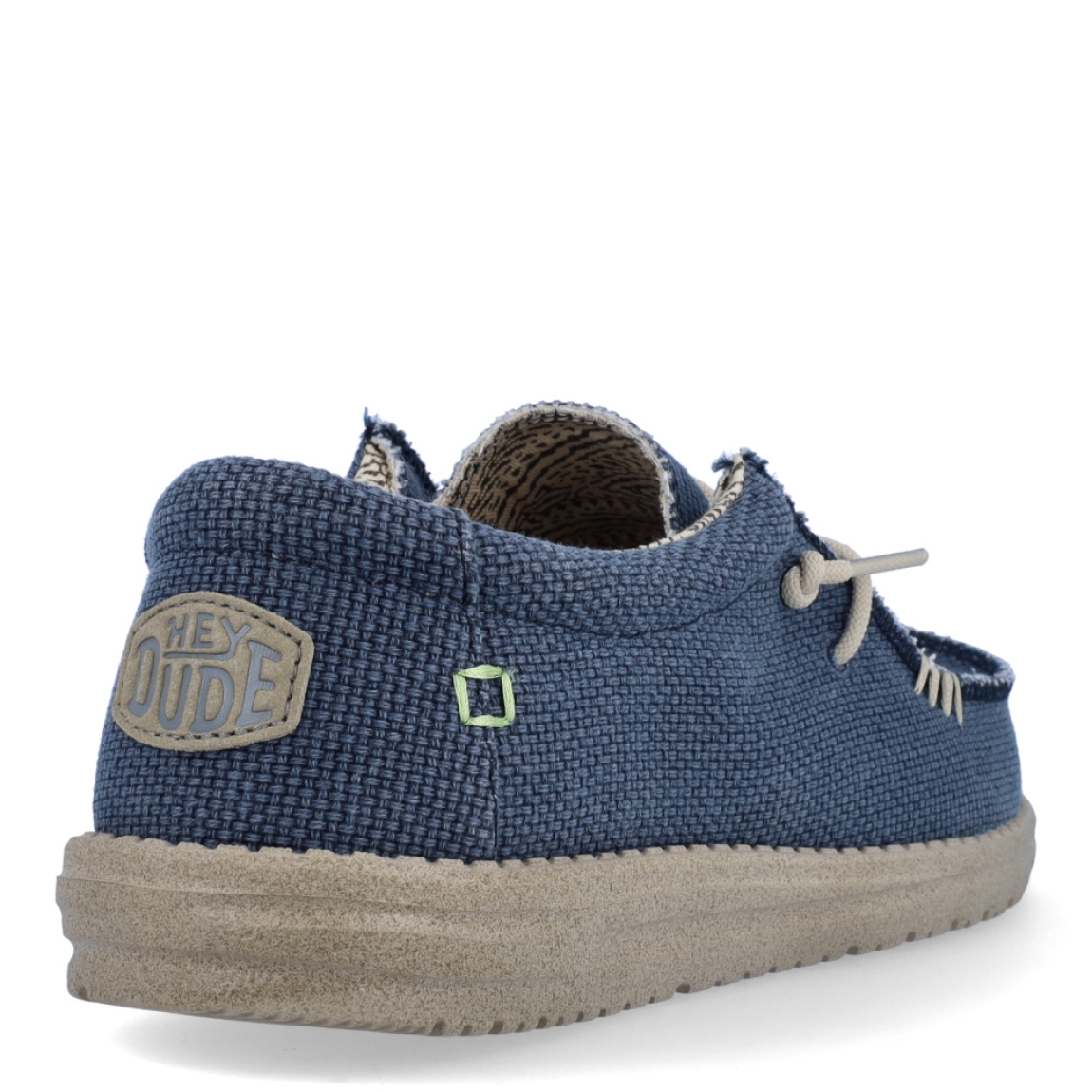 Náuticos de la marca Hey Dude, modelo WALLY BRAIDED. Exterior de los náuticos en tela color azul. Interior de los náuticos en tela con estampado gris y plantilla acolchada y extraíble. Cierre de los náuticos Hey Dude con cordones elásticos y suela plana de goma. Estos náuticos Hey Dude WALLY BRAIDED, son el complemento perfecto para esta temporada, los podrás lucir con la máxima comodidad posible.