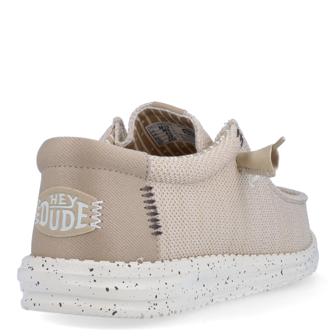 Náuticos de la marca Hey Dude, modelo WALLY STRECH. Exterior de los náuticos en tela color beig. Interior de los náuticos en tela estampada color beig y plantilla acolchada y extraíble. Cierre de los náuticos Hey Dude con cordones elásticos y suela plana de goma. Estos náuticos Hey Dude WALLY STRECH, son el complemento perfecto para esta temporada, los podrás lucir con la máxima comodidad posible.