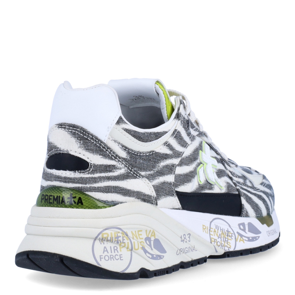 Deportivas de la marca Premiata, modelo MASED. Exterior de las deportivas en tejano con estampado animal print de cebra, detalle del logo en color blanco y aplicaciones en verde neón. Interior de las deportivas en piel color blanco. Cierre de las deportivas Premiata con cordones. Deportivas con cuña de 3cm de altura. Estas deportivas Premiata MASED son un complemento ideal para tu armario de temporada!