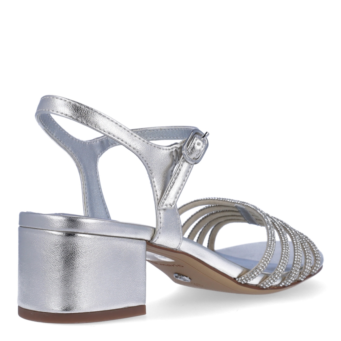 Sandalias de la marca Tamaris, modelo ZOE. Exterior en piel color plata con detalle de brillantes en tiras de pala. Interior en piel color plata. Cierre de las sandalia Tamaris con hebilla en tobillo y tacón de 4cm de altura. Estas sandalias Tamaris ZOE son ideales para tus eventos importantes, con ellas lucirás un estilo único!