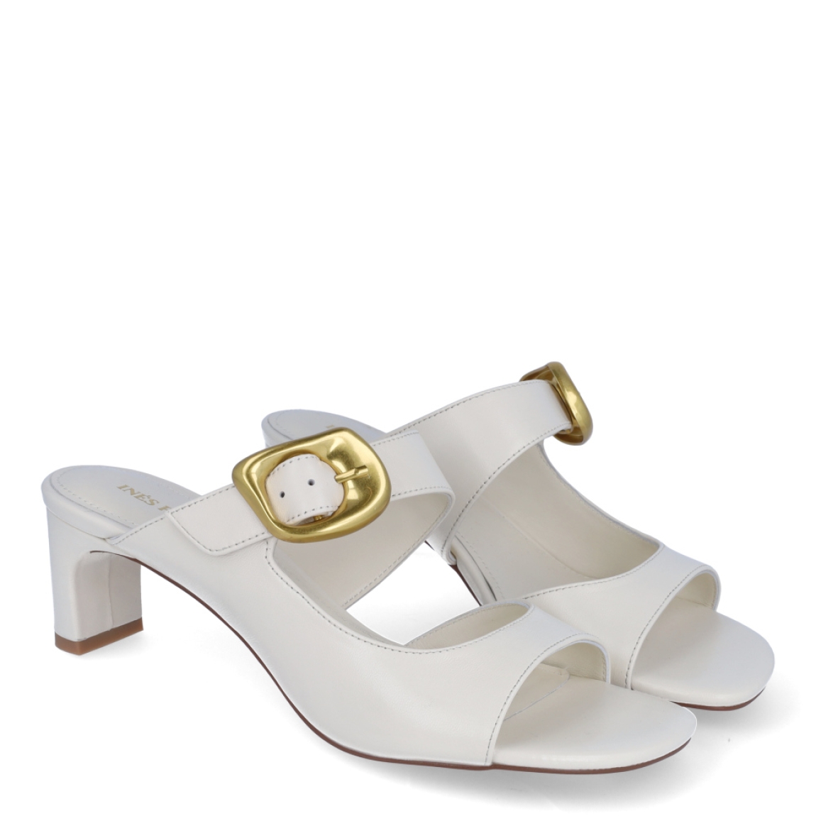 Sandalias de la marca Ines Palliser, modelo HELLA. Exterior en piel color blanco con punta redonda y cierre de hebilla color dorado en pala. Interior en piel color blanco. Sandalias con tacón de 5cm de altura. Estas sandalias Ines Palliser HELLA son unas clásicas, ideales para darle el look de elegancia y comodidad a tus looks!