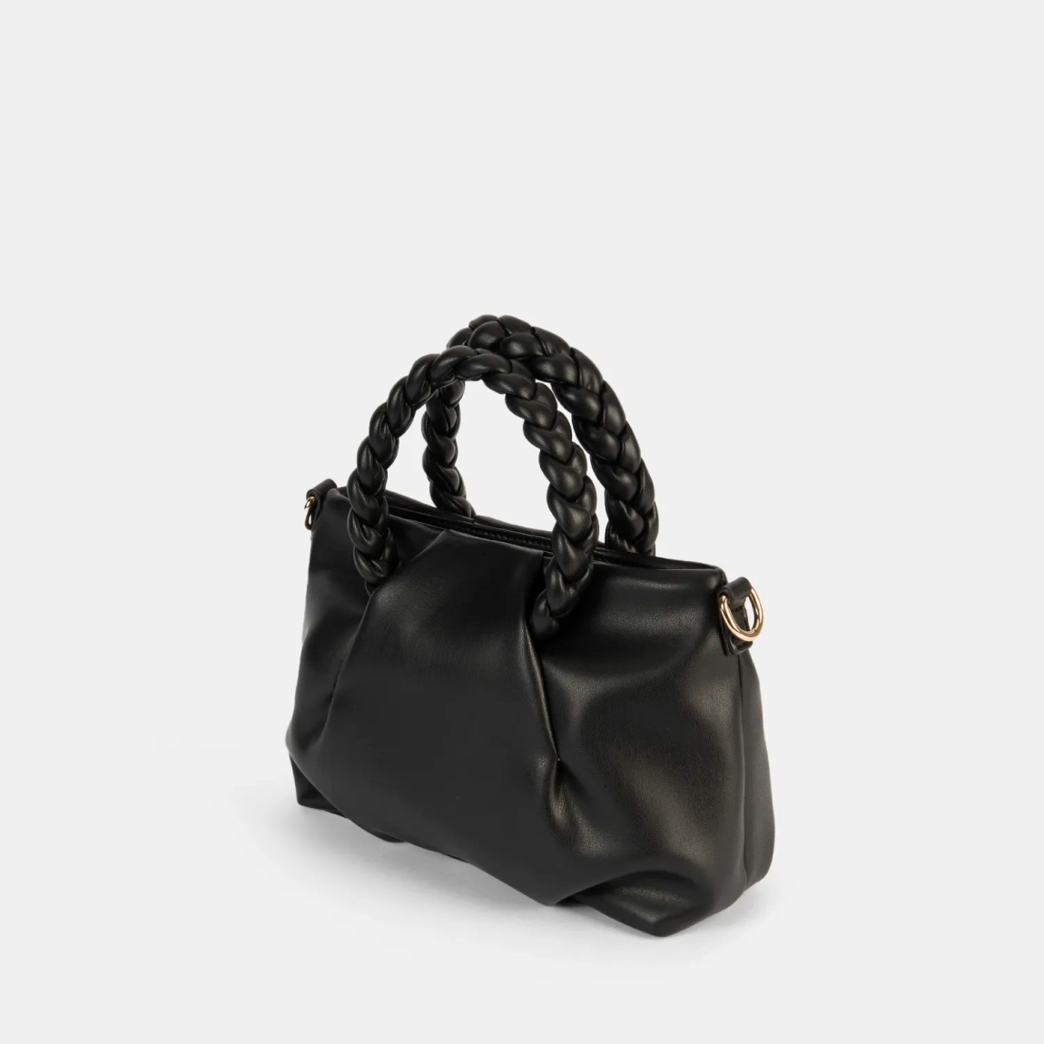 El bolso de mano de la marca Pepe Moll, modelo GIANE. Este bolso elaborado en polipiel color negro es la fusión perfecta entre elegancia y tendencia. Su diseño estructurado con asas trenzadas aporta un aire sofisticado y moderno, ideal para elevar cualquier look. Versátil y espacioso, es la elección perfecta para el día a día o para ocasiones especiales donde el estilo es imprescindible. Cierre con cremallera. Medidas: alto 17cm y ancho 22cm.