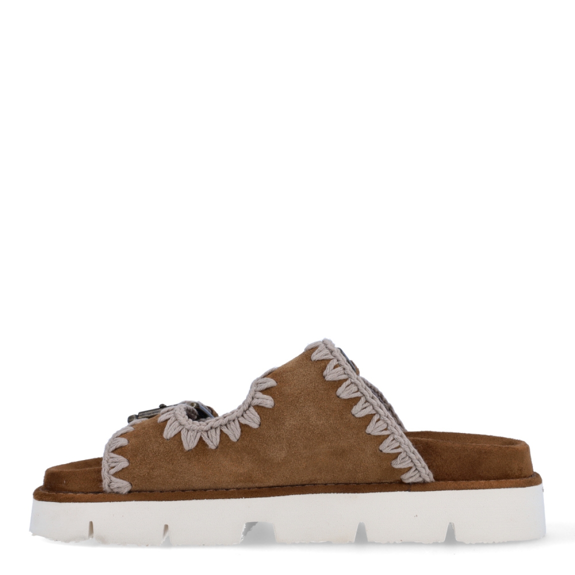 Sandalias Mou. modelo 10A. Estas elegantes sandalias bio est'an elaboradas de ante color marron con dos hebillas están fabricadas a mano con cuero de primera calidad y la característica costura de ganchillo de la marca. Este modelo cuenta con una ligera suela exterior de EVA y una plantilla acolchada de ante para mayor comodidad. Sandalias con plataforma de 3cm. Estas sandalias Mou 10A son ideales para esta temporada!