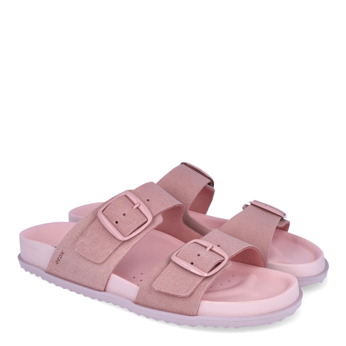 Sandalia para mujer de la marca Geox modelo SANDYBETT. Elaborada en neopreno color rosa, de estilo diario, que garantiza confort y transpirabilidad durante todo el día. Cierre con doble hebilla en pala. Este modelo, cuenta con una empella de suave gamuza. Ideal para la ciudad, Sandybett está pensada para añadir un toque moderno a los looks de verano.