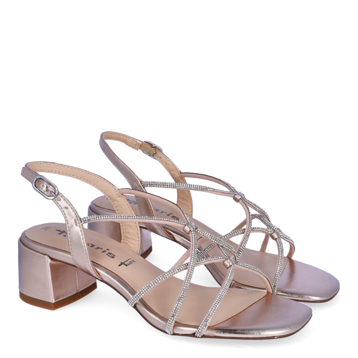 Sandalias de la marca Tamaris, modelo ZOEY. Exterior en piel color platino con detalle de brillantes en tiras cruzadas en pala. Interior en piel color platino. Cierre de las sandalias Tamaris con hebilla en tobillo y tacón de 5cm de altura. Estas sandalias Tamaris ZOEY son ideales para tus eventos importantes, con ellas lucirás un estilo único!