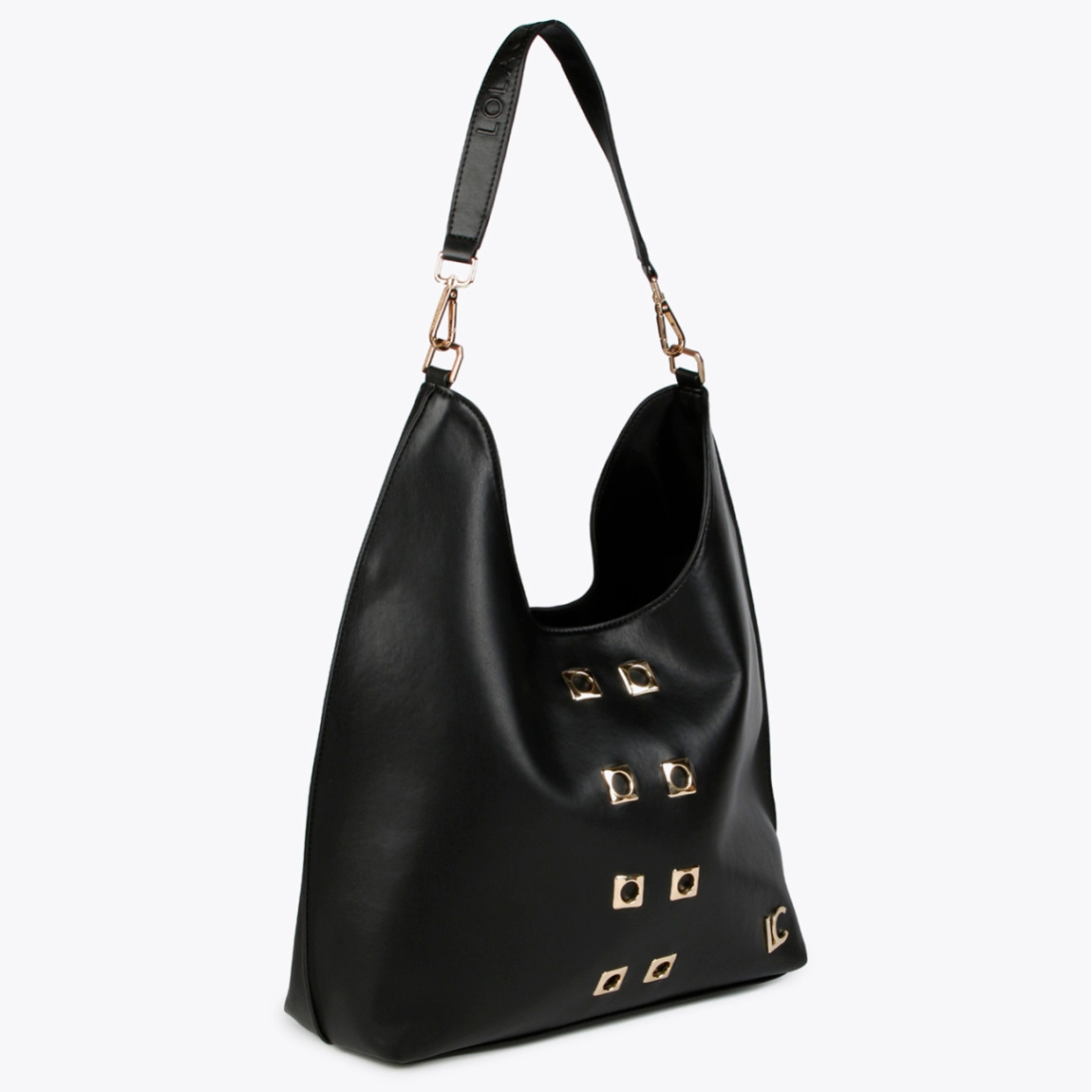 Bolso shopper de la marca Lola Casademunt, modelo LUQUE. Bolso elaborado en efecto piel con ojales metálicos cuadrados. Detalle de bolsillo interior con cremallera. Contiene asa para hombro y cierre de imán. ALTO: 40,5 cm - LARGO: 35,5 cm - ANCHO: 12,5 cm