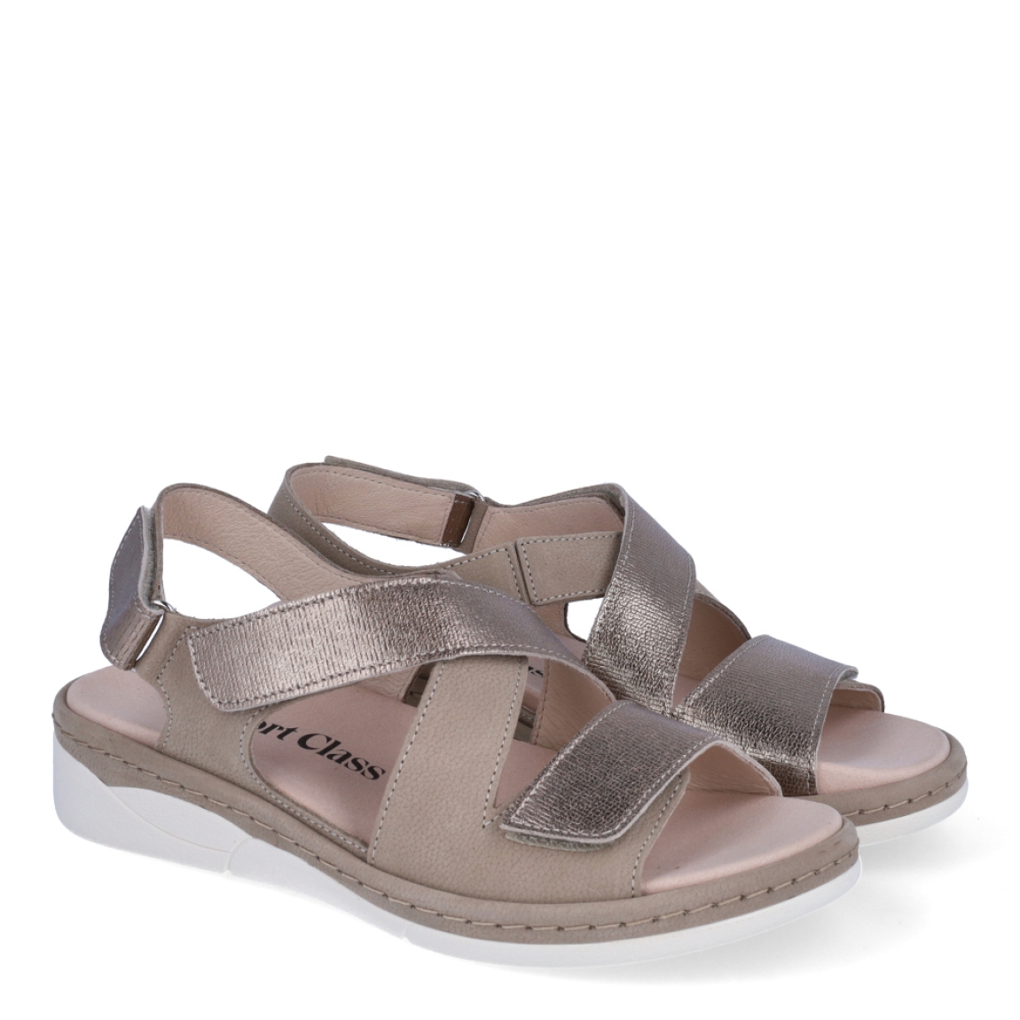 Sandalias de la marca Comfort Class, modelo WANDA. Exterior de las sandalias en piel color taupe. Interior de las sandalias en piel color nude. Cierre de las sandalias Comfort Class con doble velcro en el tobillo y cuña de 4cm de altura. Estas sandalias Comfort Class WANDA es el complemento ideal para esta temporada, crearás diferentes looks con la máxima comodidad posible.