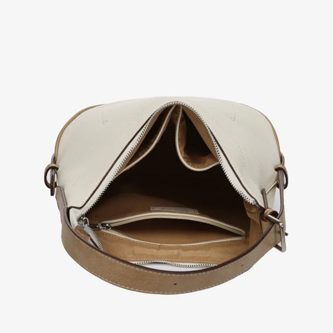 Bolso de hombro estilo hobo de la marca Abbacino, modelo BIEL. Bolso elaborado en piel color beig con detalles color cueroconfeccionado con materiales reciclados. Su diseño simple y minimalista, teñido en colores veraniegos, ofrece un amplio espacio interior. Interior amplio y perfectamente distribuido. Cierre con cremallera y su asa multifuncional, permite convertir el bolso en una práctica bandolera. Medidas: alto 20cm y ancho 28cm.