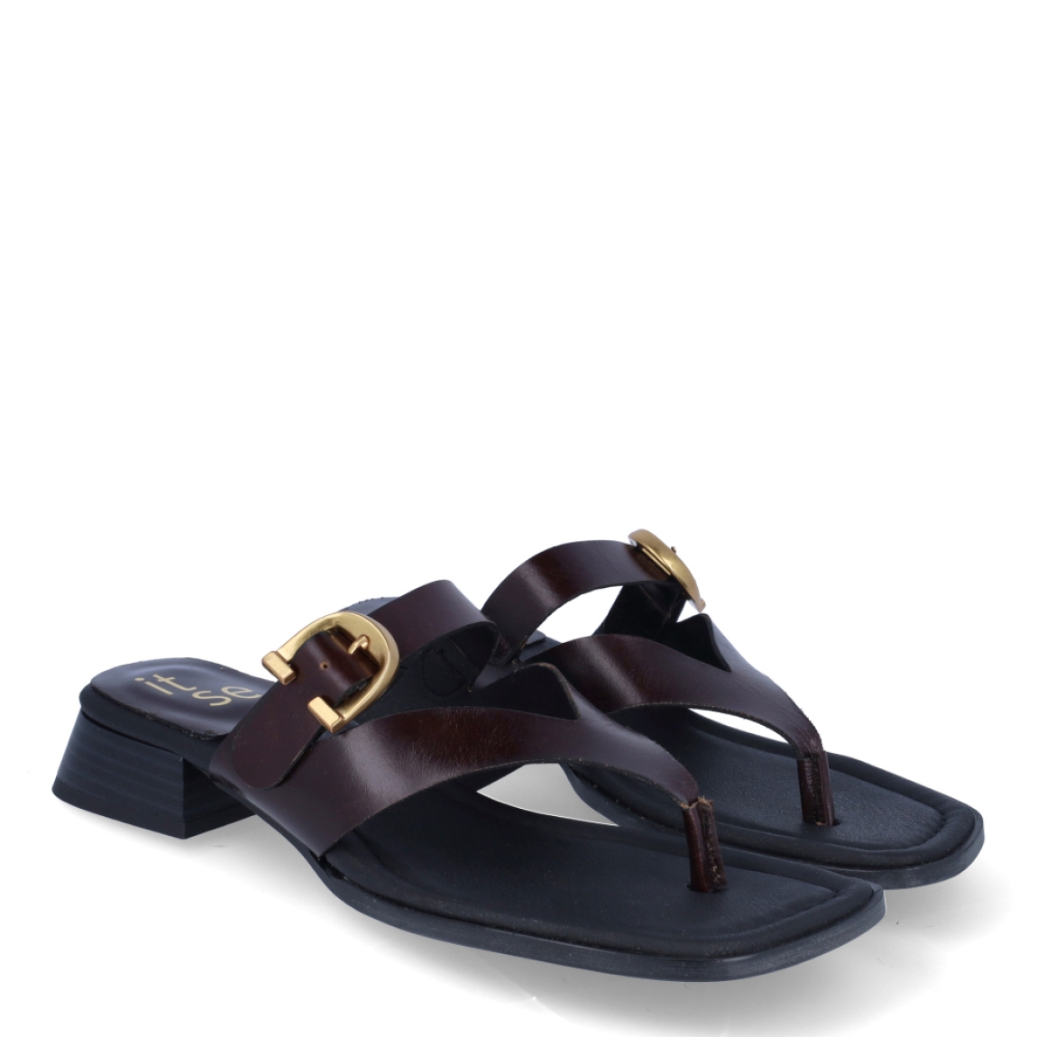 Sandalias de la marca Itse, modelo CROSLY. Sandalias elaboradas en piel color marrón. Interior en piel color negro con estampado de marca. Cierre de las sandalias con hebilla en pala y tacón de 2cm de altura. Estas sandalias Itse CROSLY son un complemento ideal para crear looks con personalidad y comodidad esta temporada. No te pueden faltar en el armario!